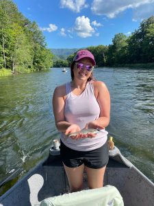 Woman holding fish